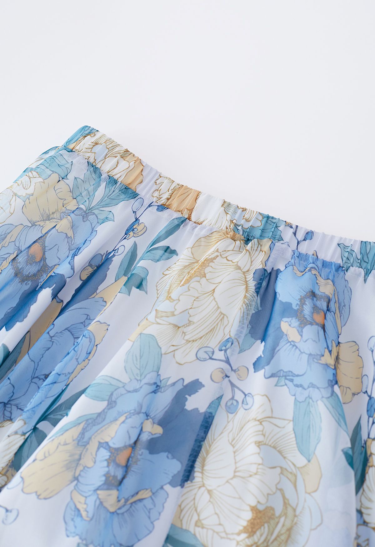 Jupe longue bleuâtre en mousseline de soie à fleurs fraîches