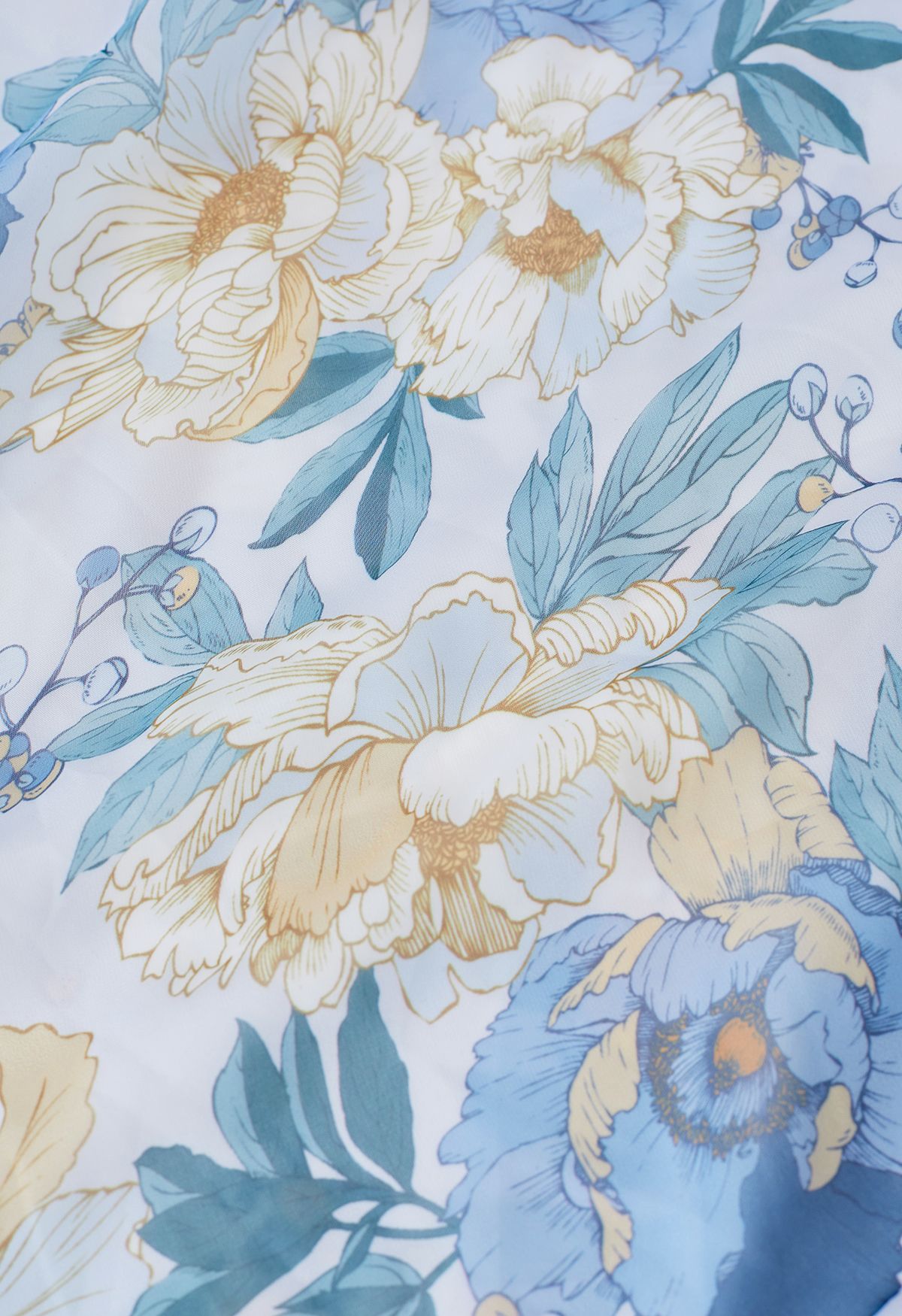 Jupe longue bleuâtre en mousseline de soie à fleurs fraîches