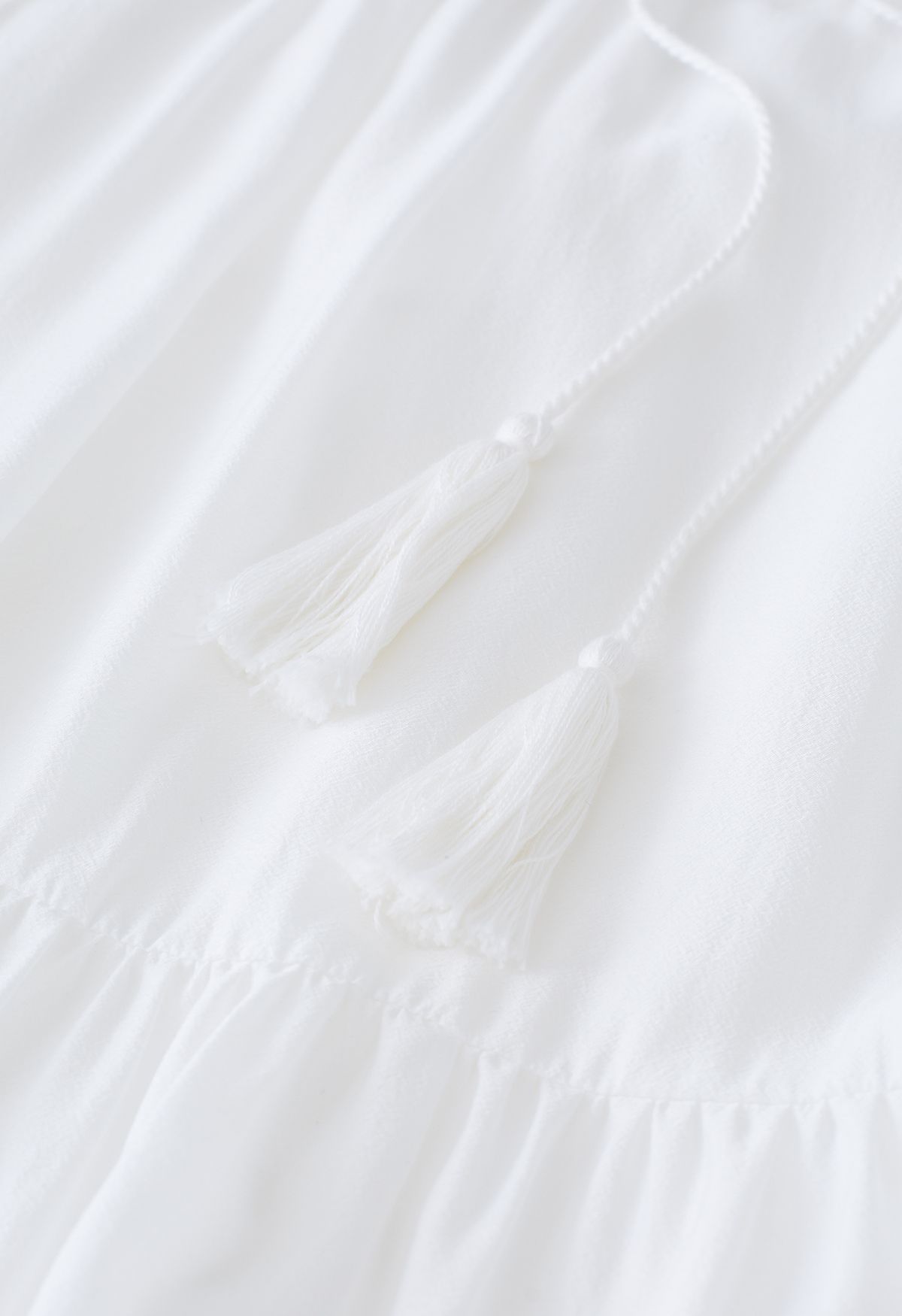 Belle robe blanche à manches bouffantes de déesse