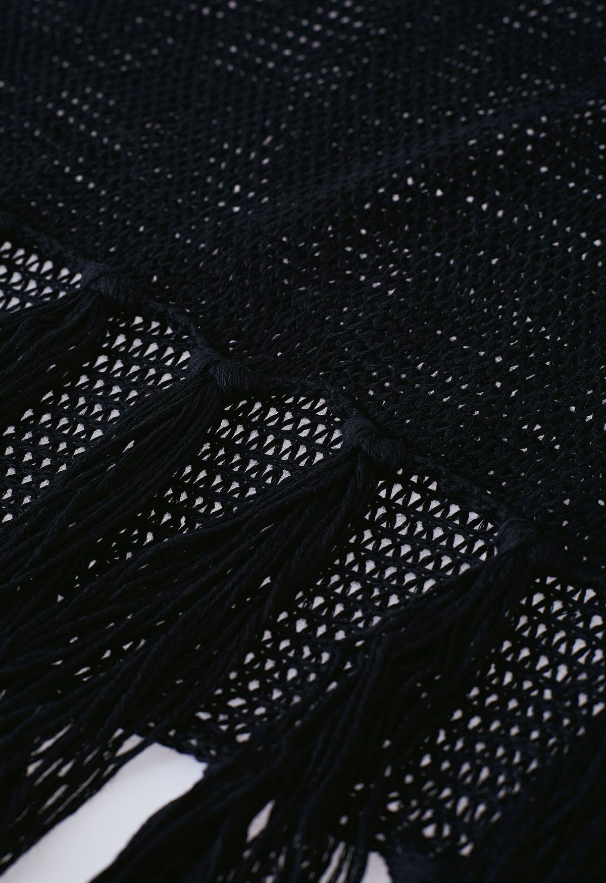 Couverture en tricot pointelle à ourlet frangé en noir