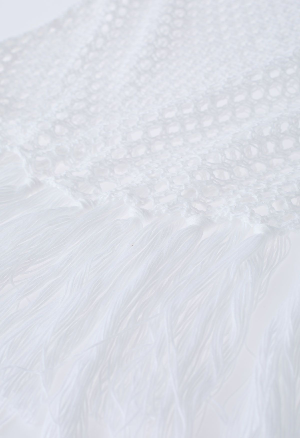 Couverture en tricot sans manches à ourlet à pampilles en blanc