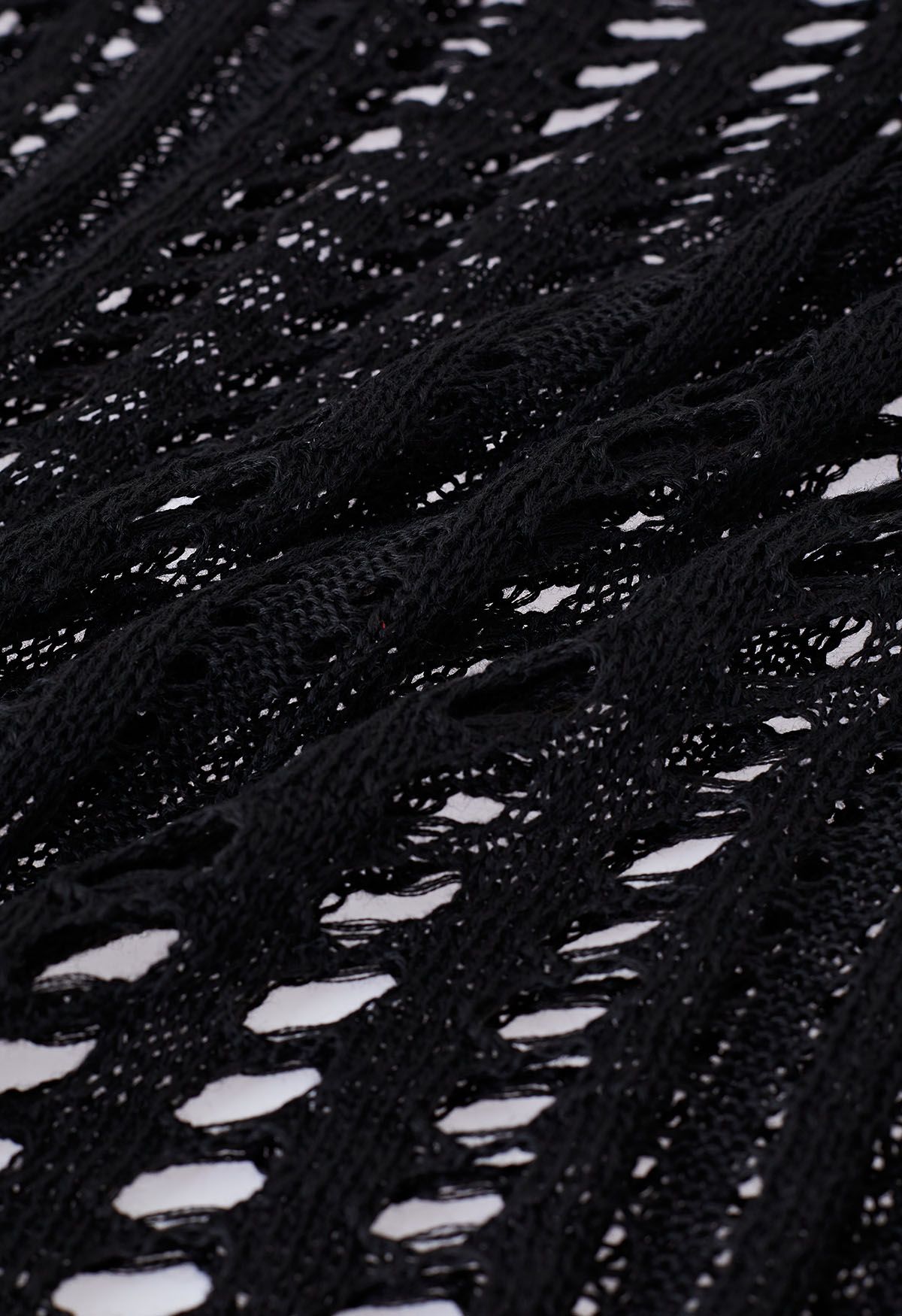 Couverture en tricot ajouré à fentes latérales en noir