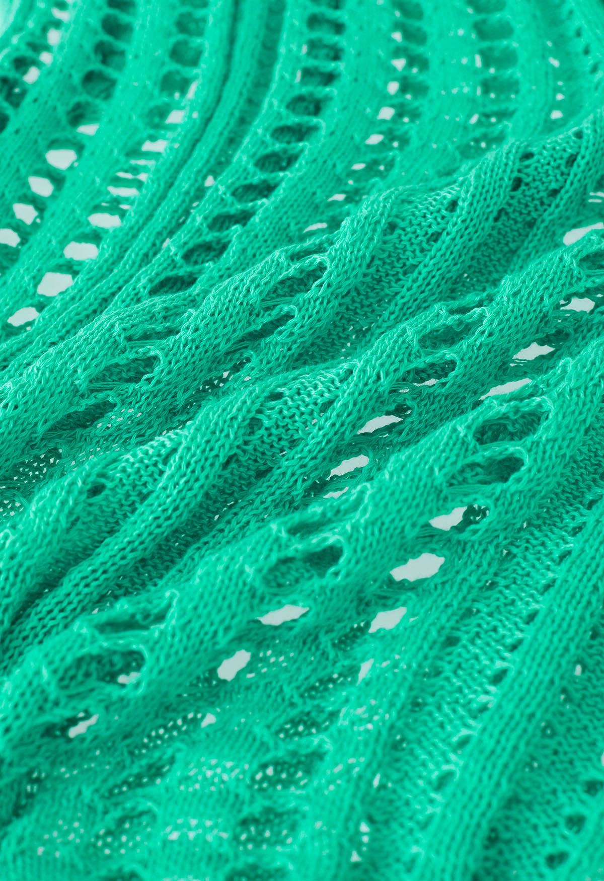 Couverture en tricot ajouré à fentes latérales en vert