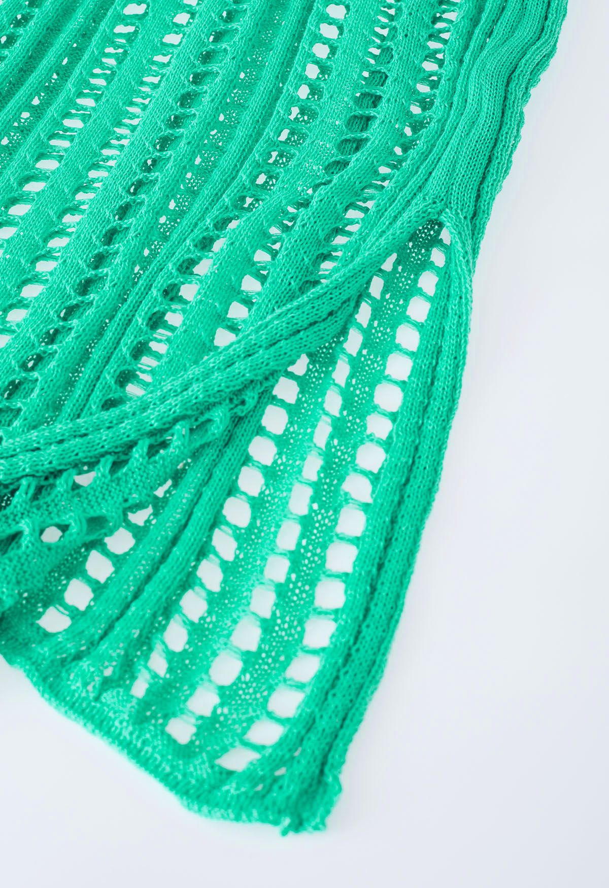 Couverture en tricot ajouré à fentes latérales en vert