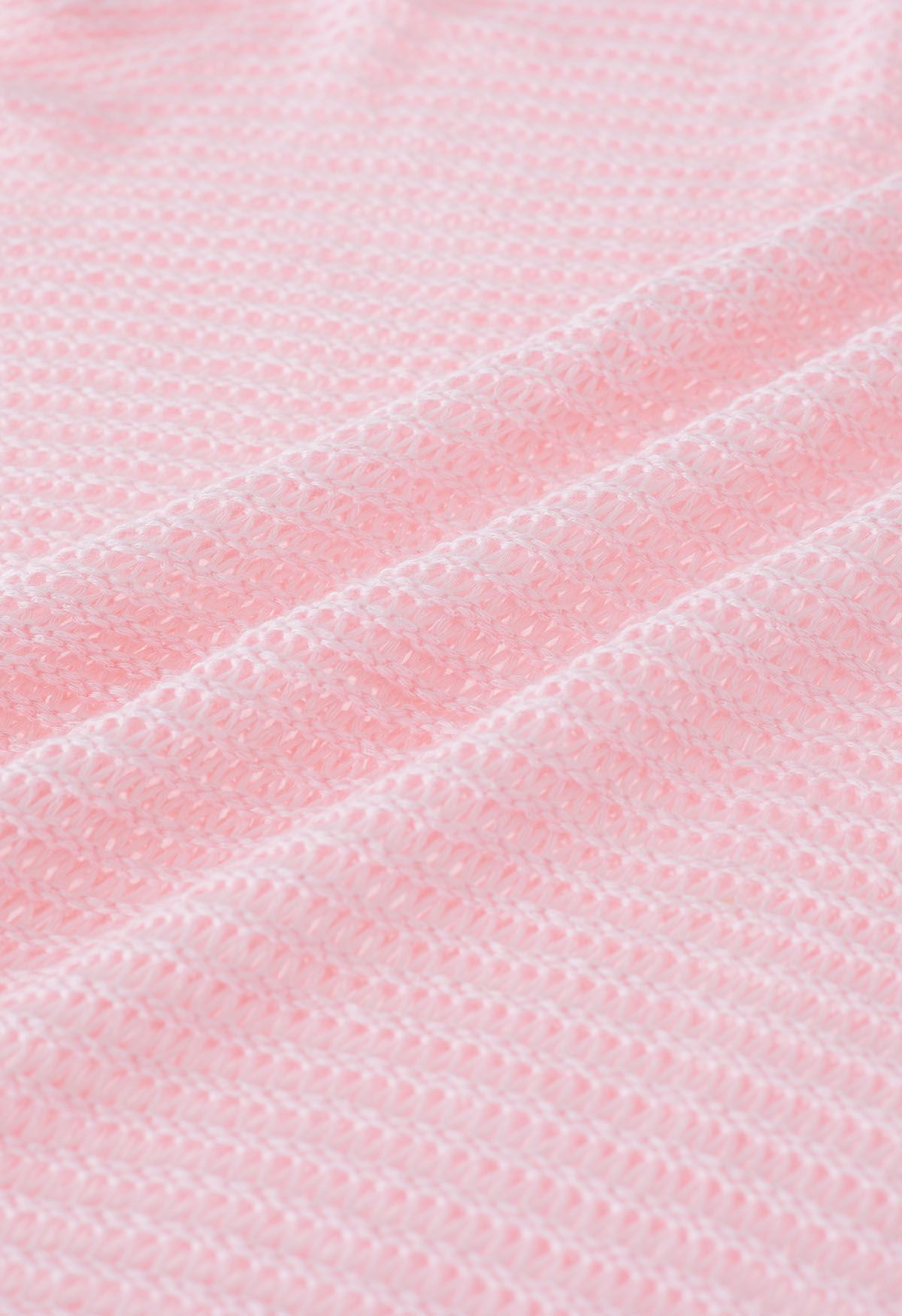 Couverture en tricot pointelle à ourlet frangé en rose