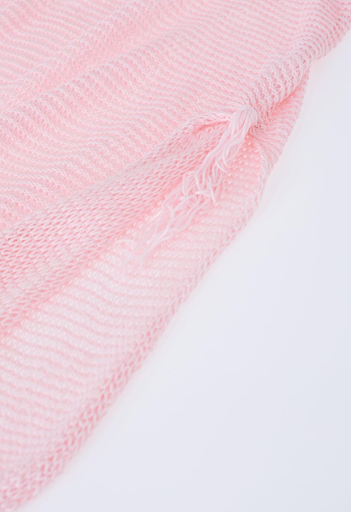 Couverture en tricot pointelle à ourlet frangé en rose