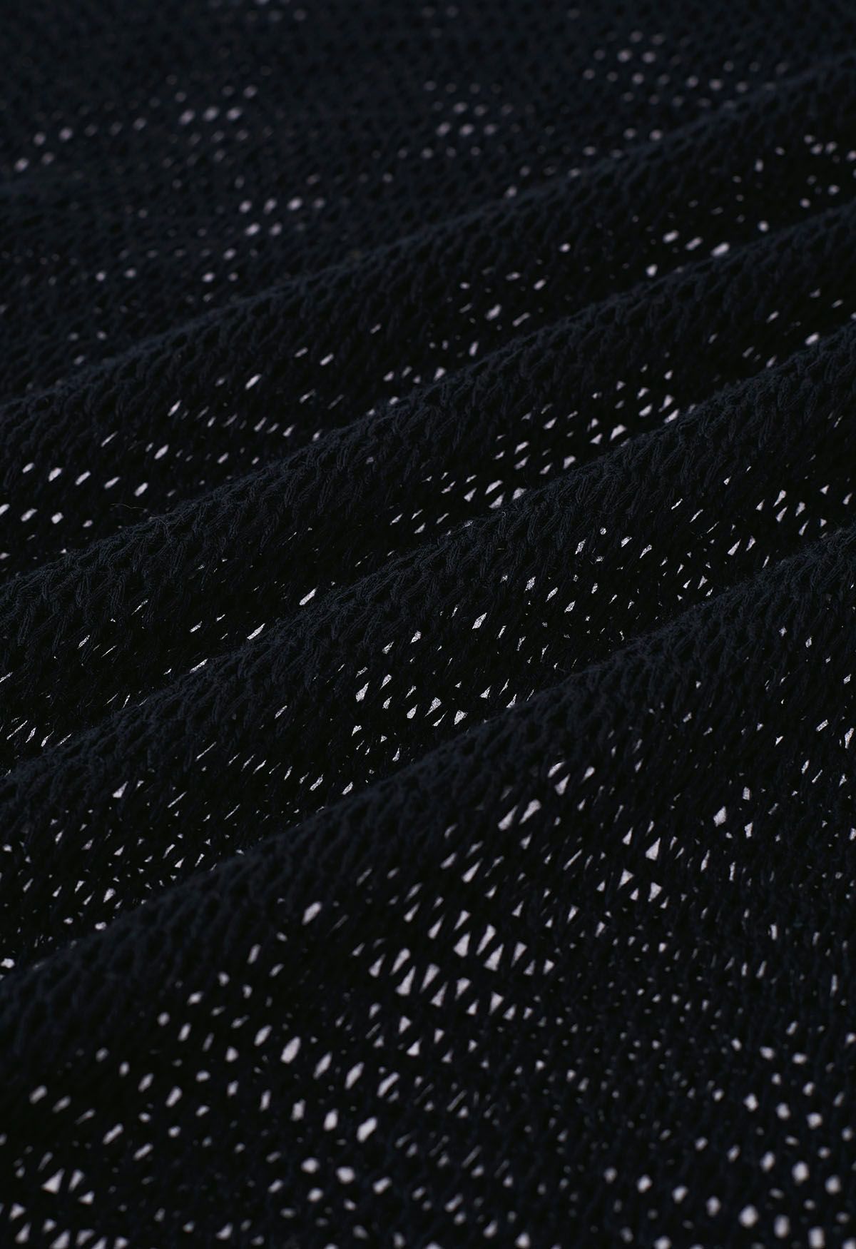 Couverture en tricot pointelle à ourlet frangé en noir