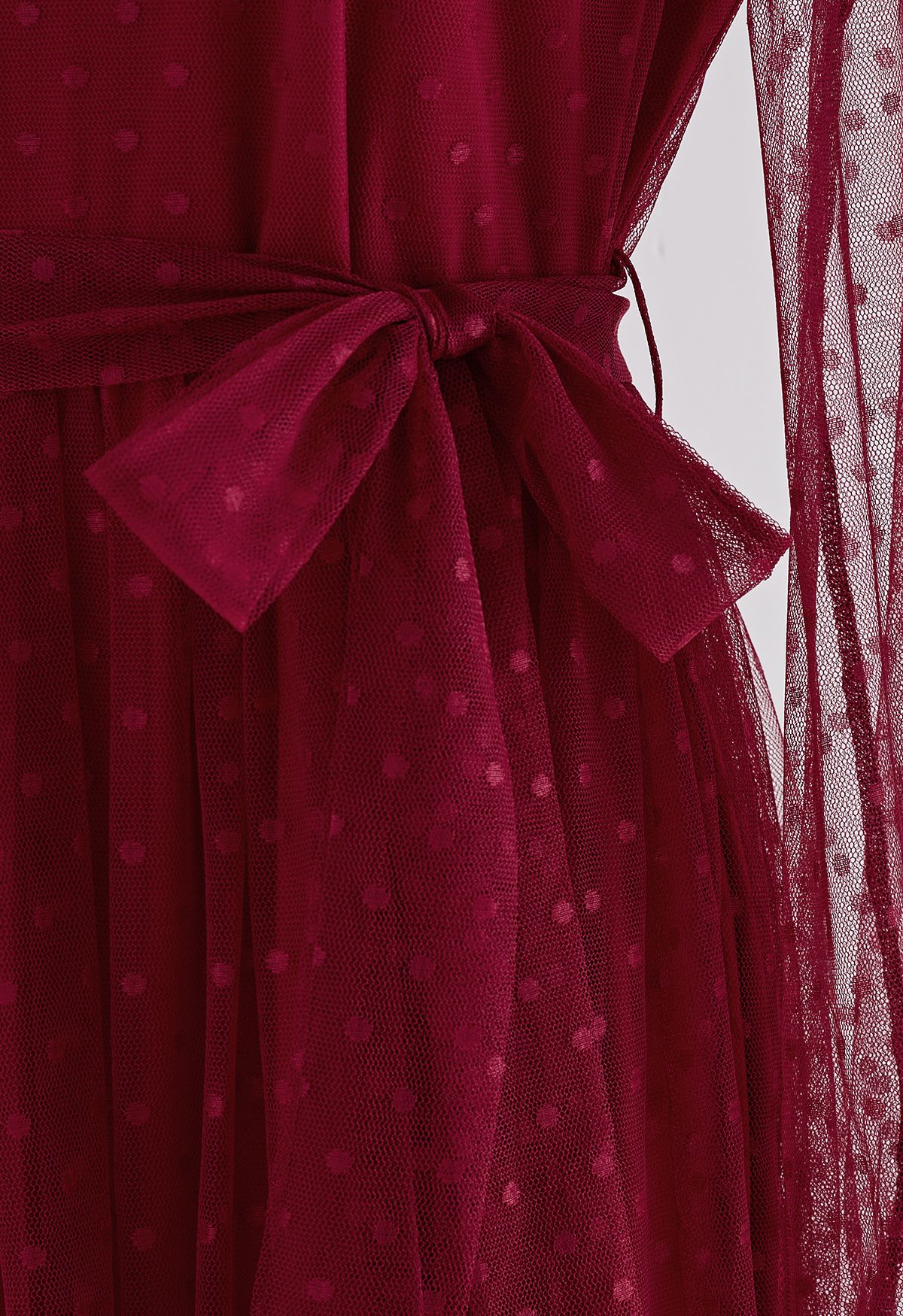 Belle robe longue en maille à pois en rouge