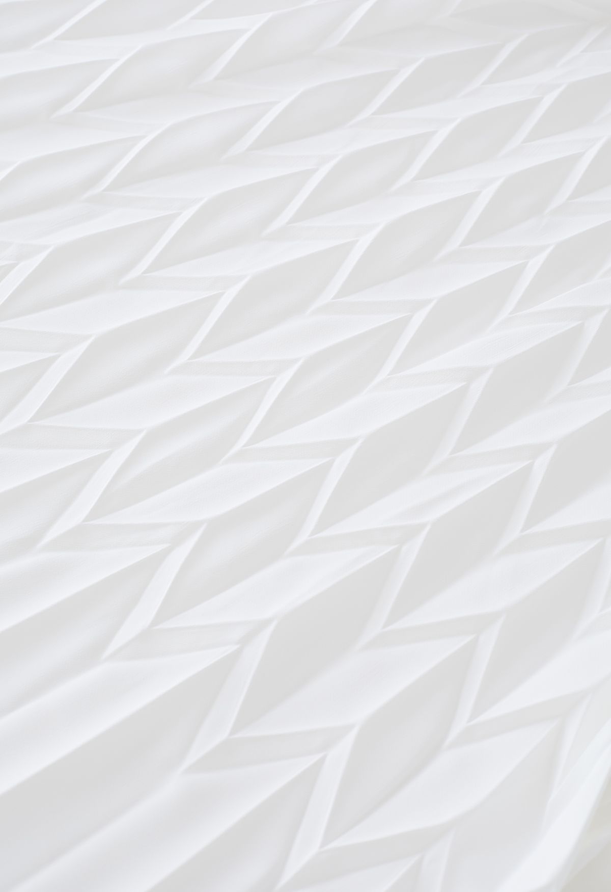 Jupe mi-longue plissée en relief zigzag en blanc