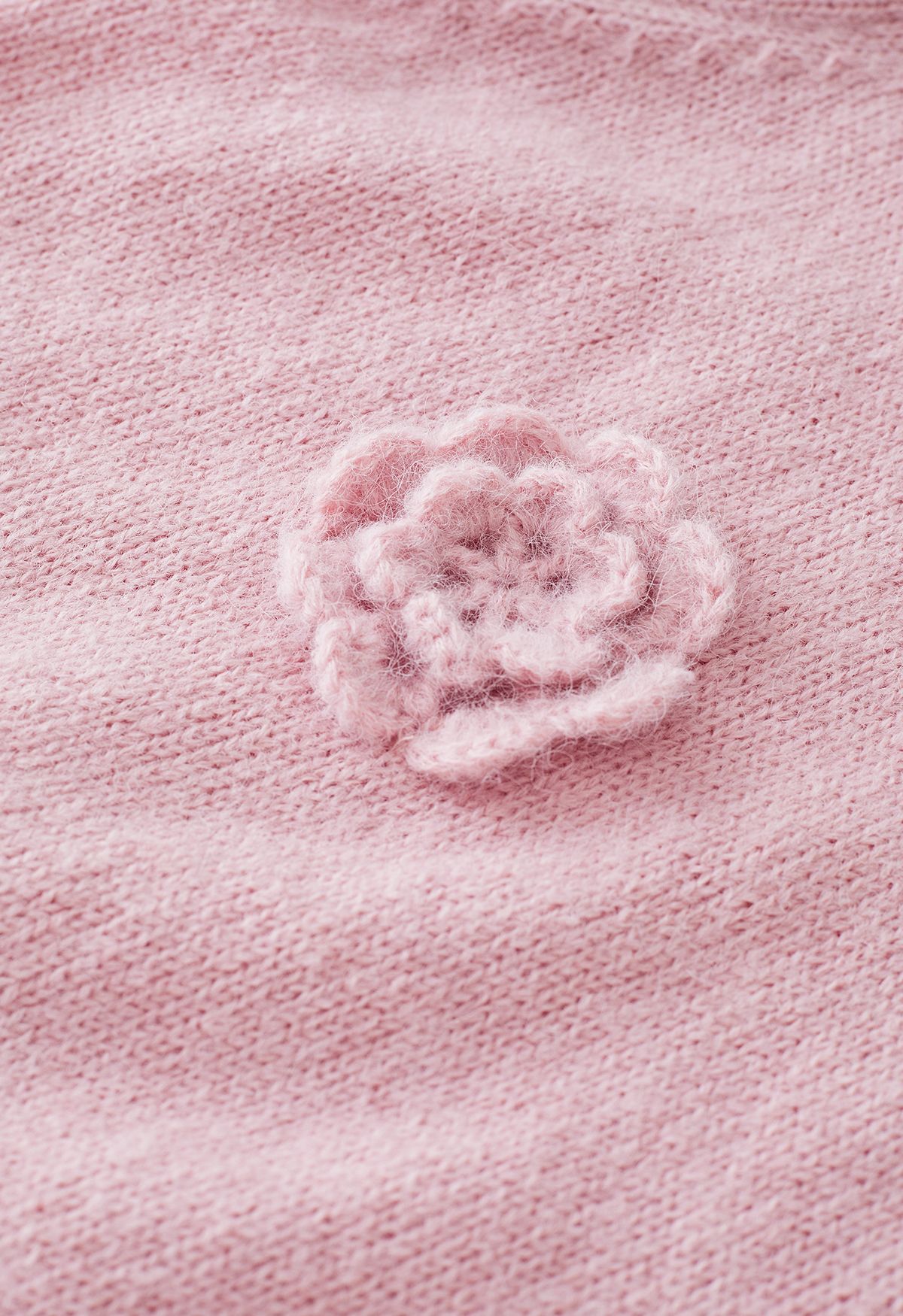 Haut en tricot à fleurs au crochet en rose