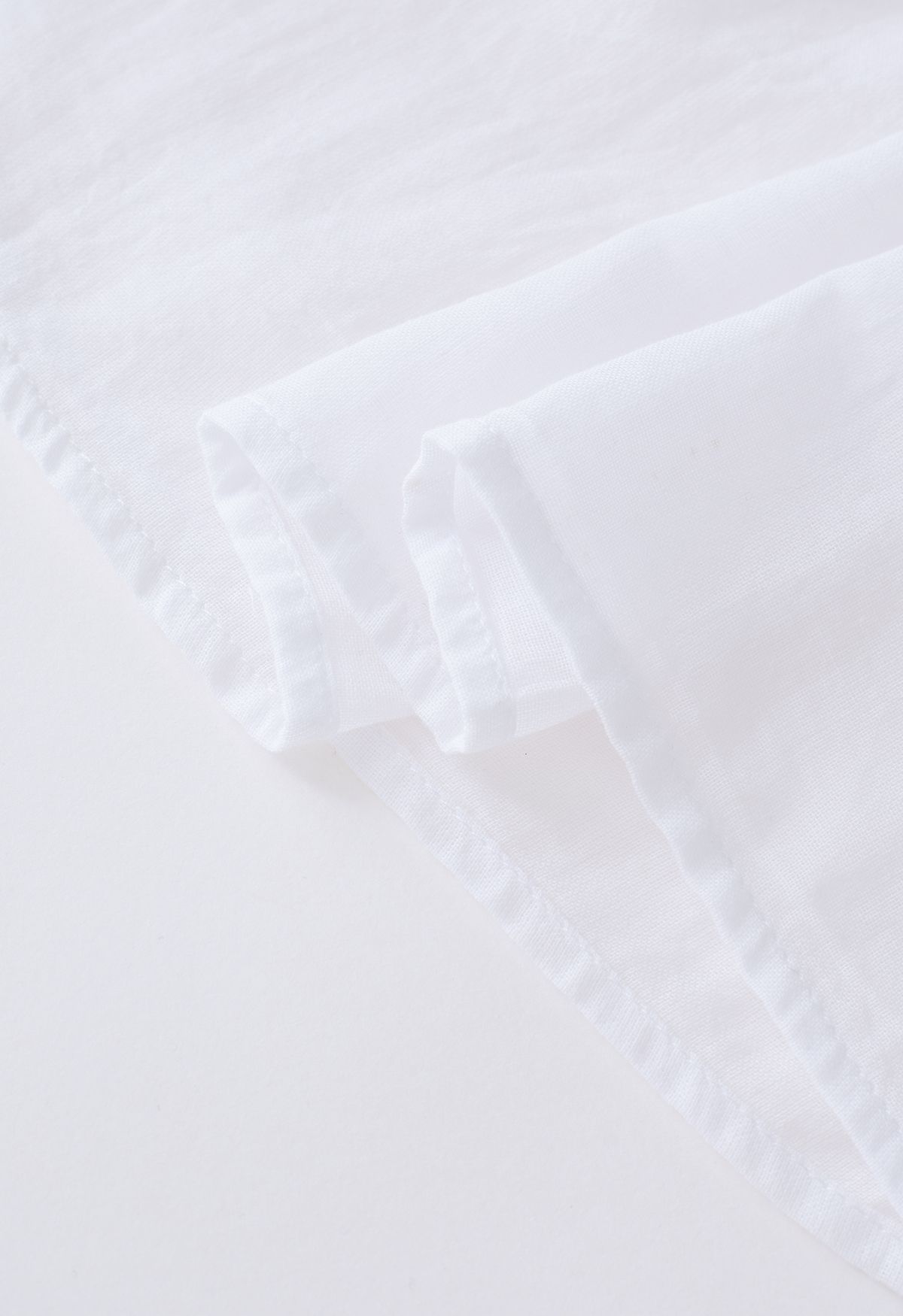Tunique en coton souple et plongeante en blanc