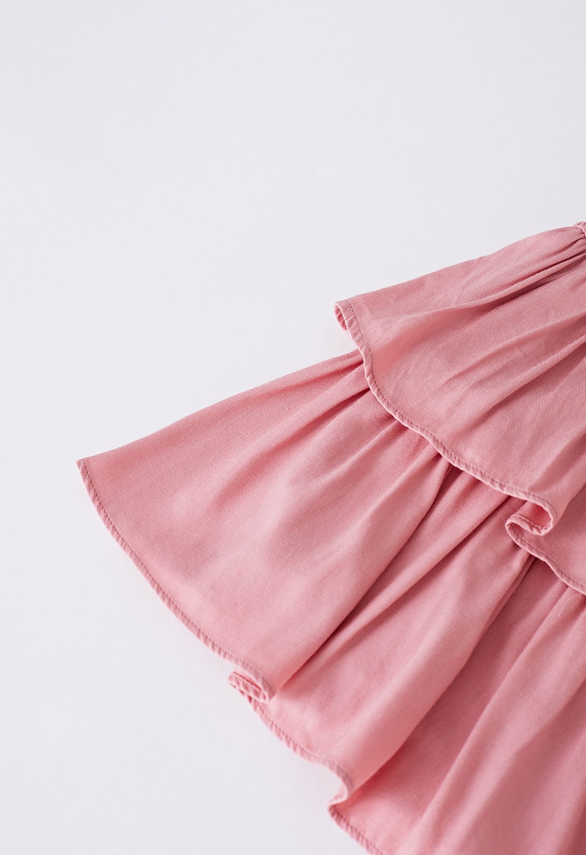 Mini-jupe froncée à volants et à volants en rose