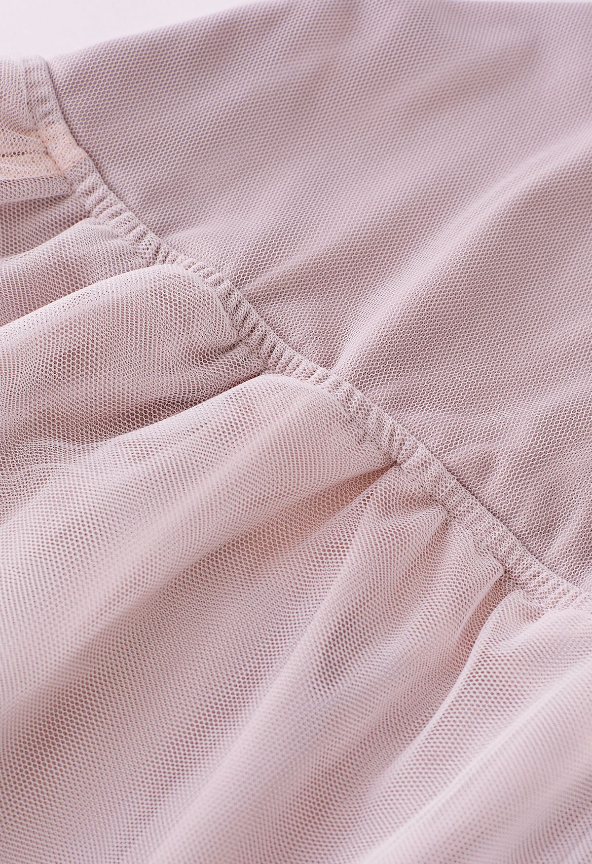 Robe en tulle à mailles croisées à dos ouvert en rose