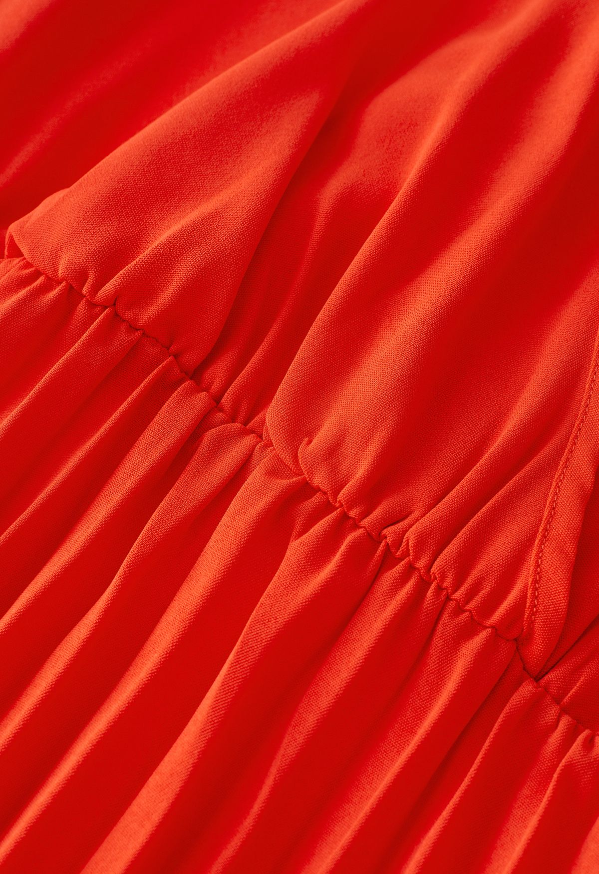 Robe portefeuille plissée sans manches ornée d'une ceinture en orange