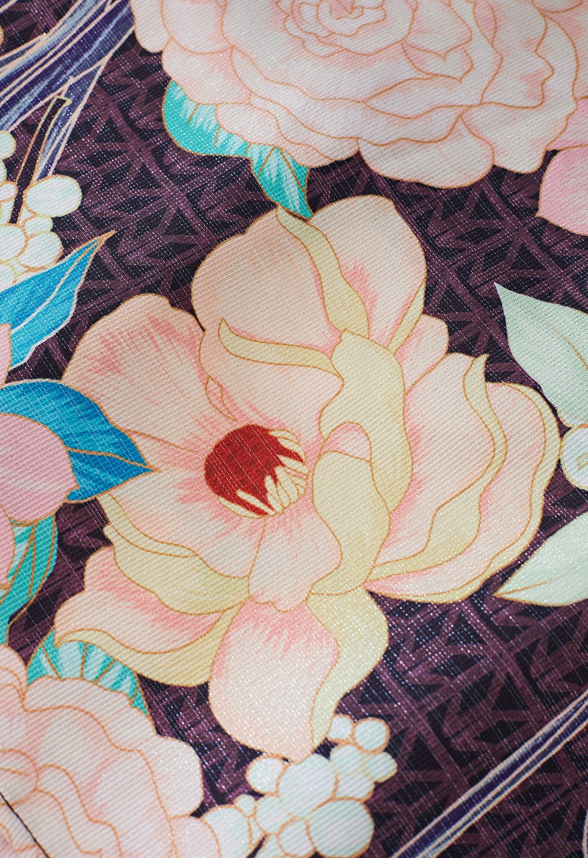 Jupe mi-longue à imprimé floral métallisé lustré