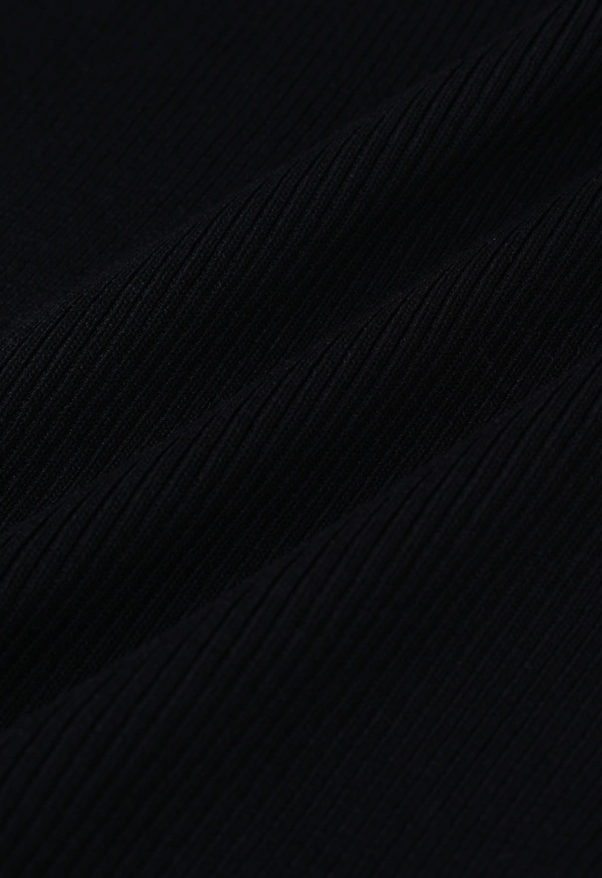 Crop top en tricot à manches flottantes et à volants épissés en noir
