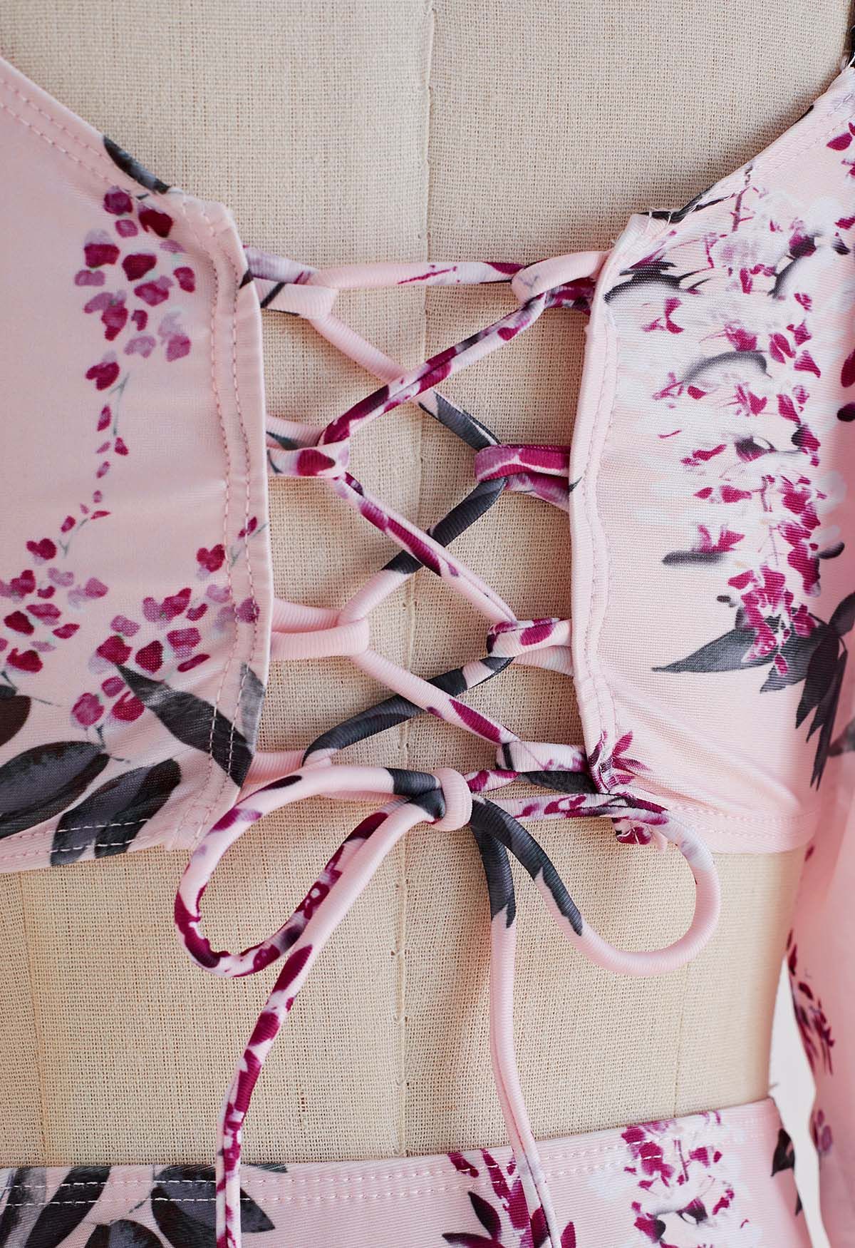 Ensemble de bikini rose à fleurs et manches semi-transparentes