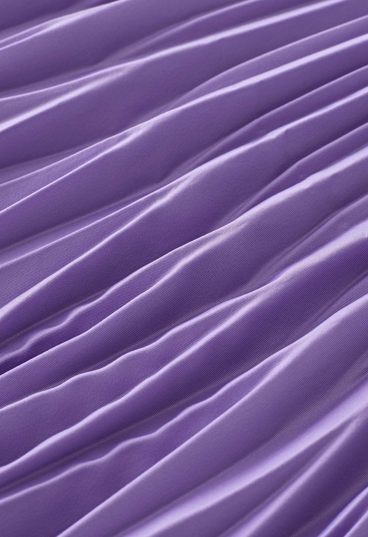 Jupe mi-longue plissée irrégulière en lilas