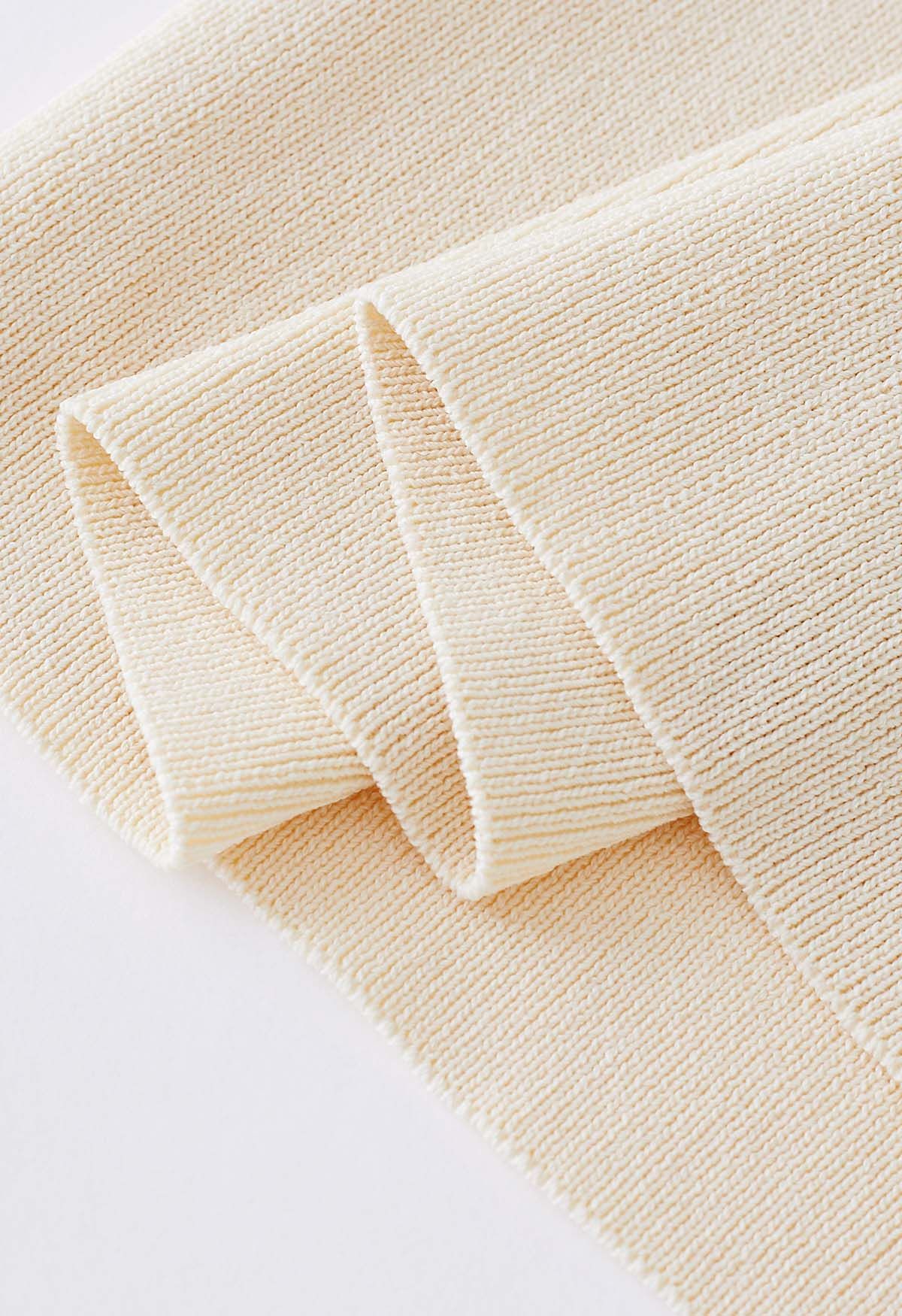 Robe moulante en tricot à encolure découpée en crème
