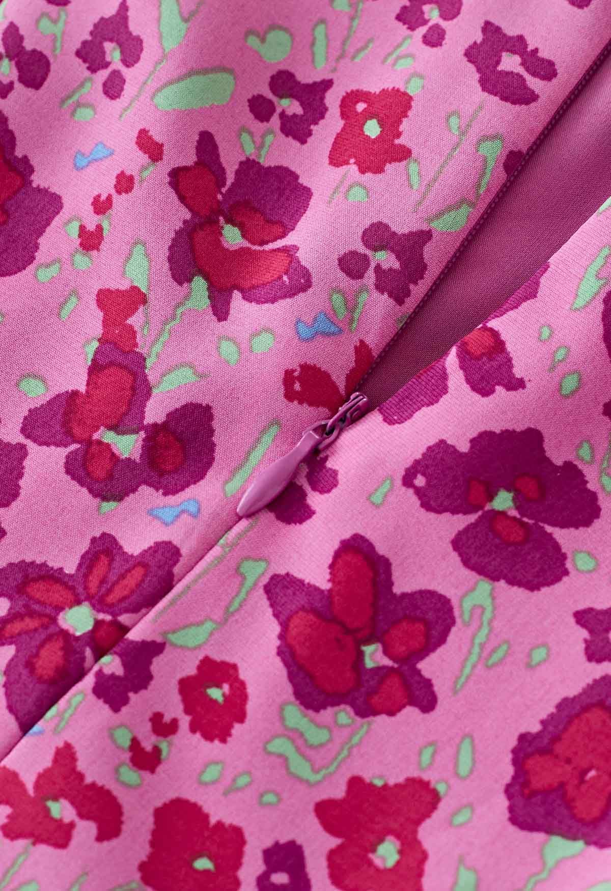 Robe mi-longue à volants asymétriques à imprimé de fleurs rouges en rose