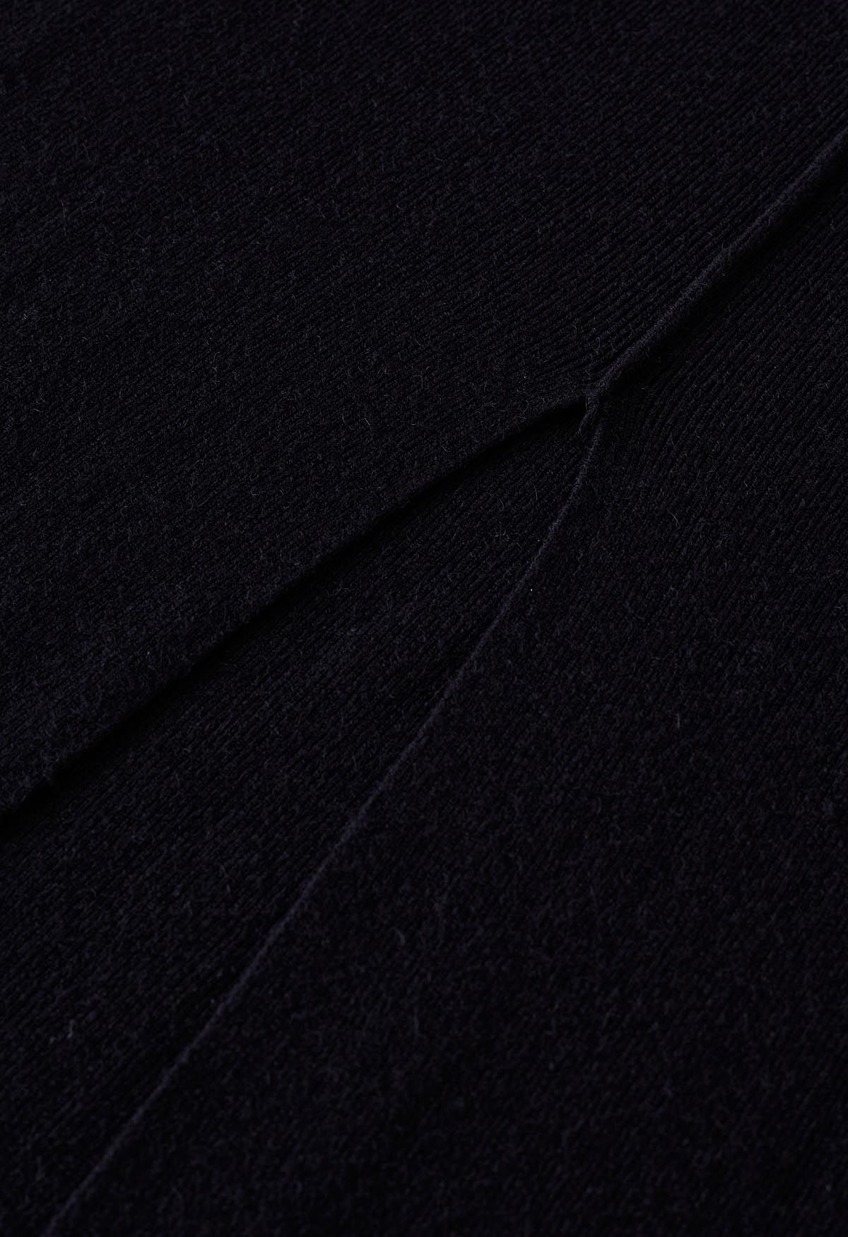 Robe moulante en maille fendue sur le devant en noir