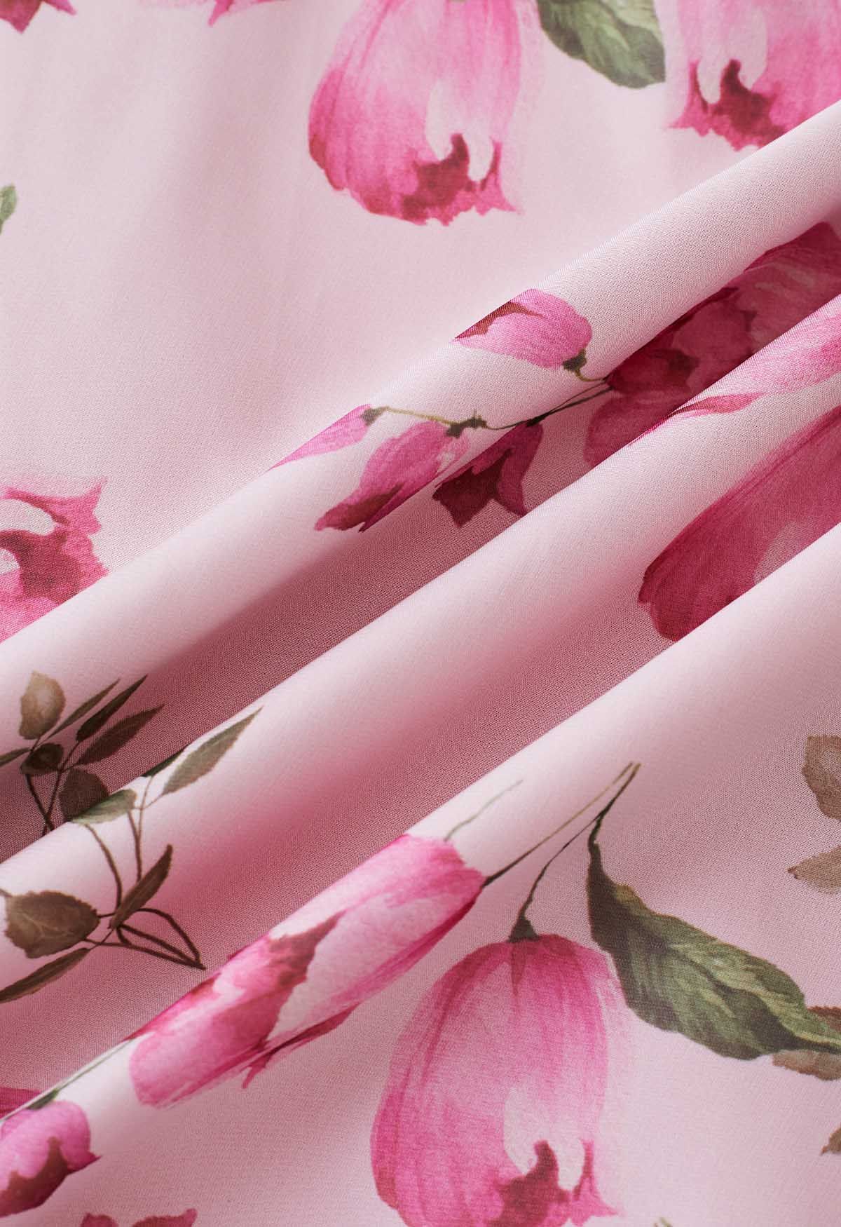 Jupe longue en mousseline de soie rose à imprimé de boutons de fleurs