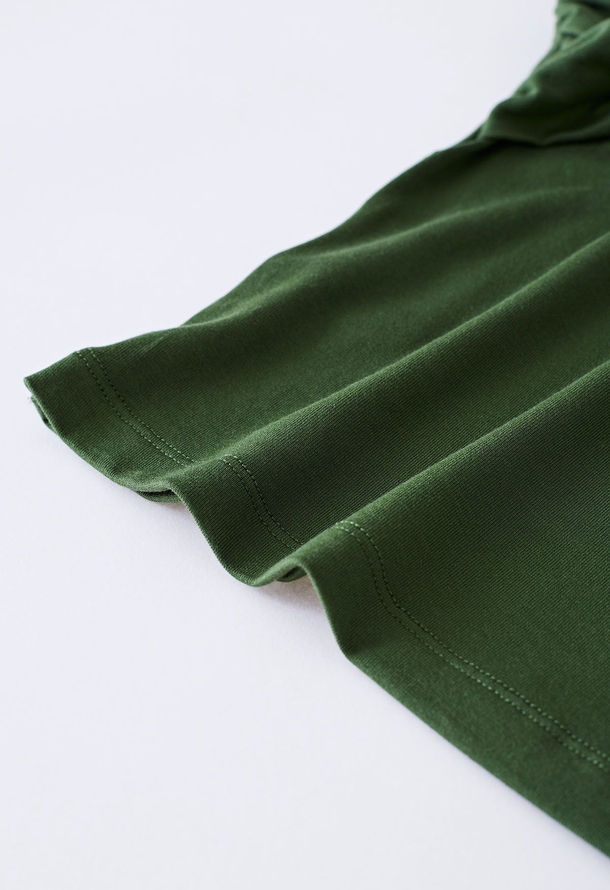 Crop top ajusté à épaules dénudées devant torsadé en vert