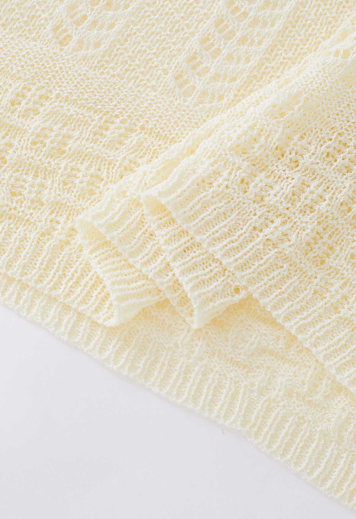 Couverture en tricot pointelle à manches flottantes en crème