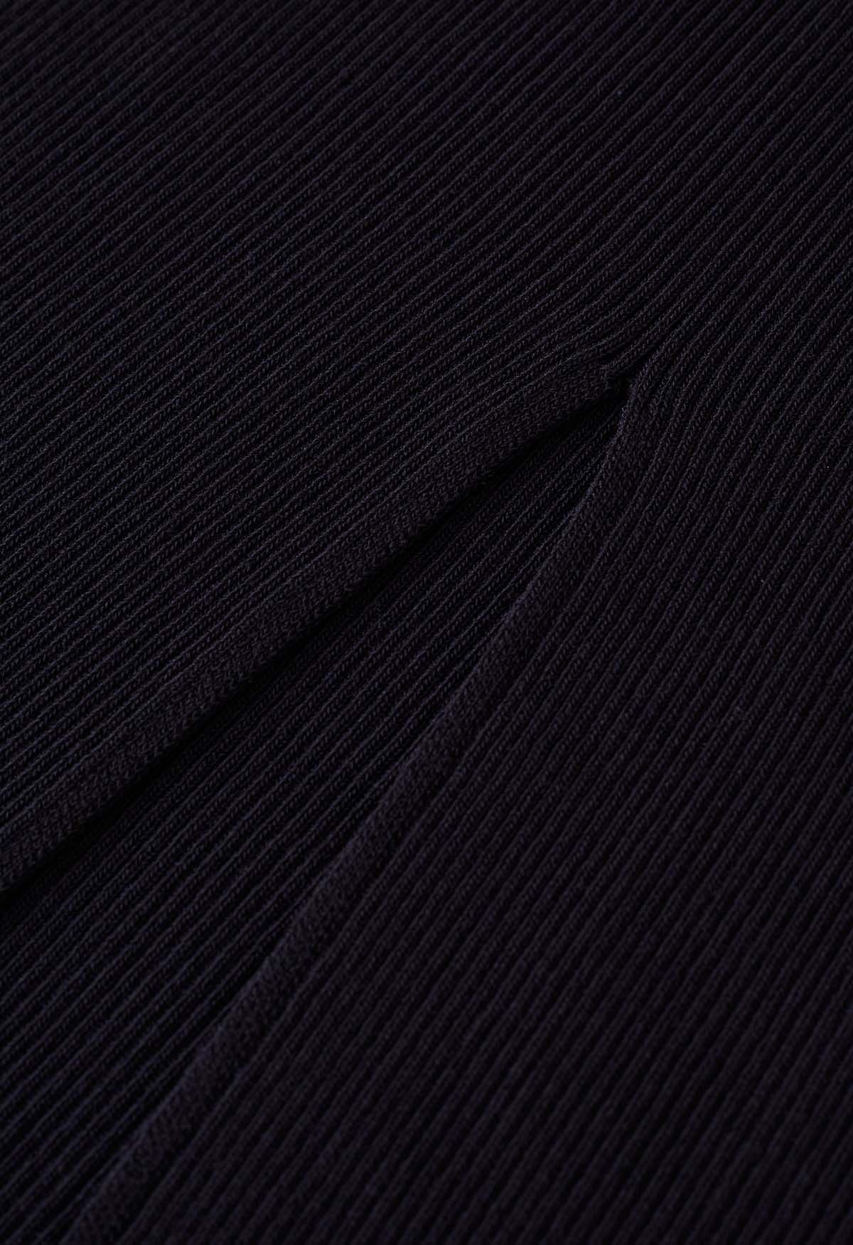 Robe caraco moulante en tricot torsadé sur le devant en noir