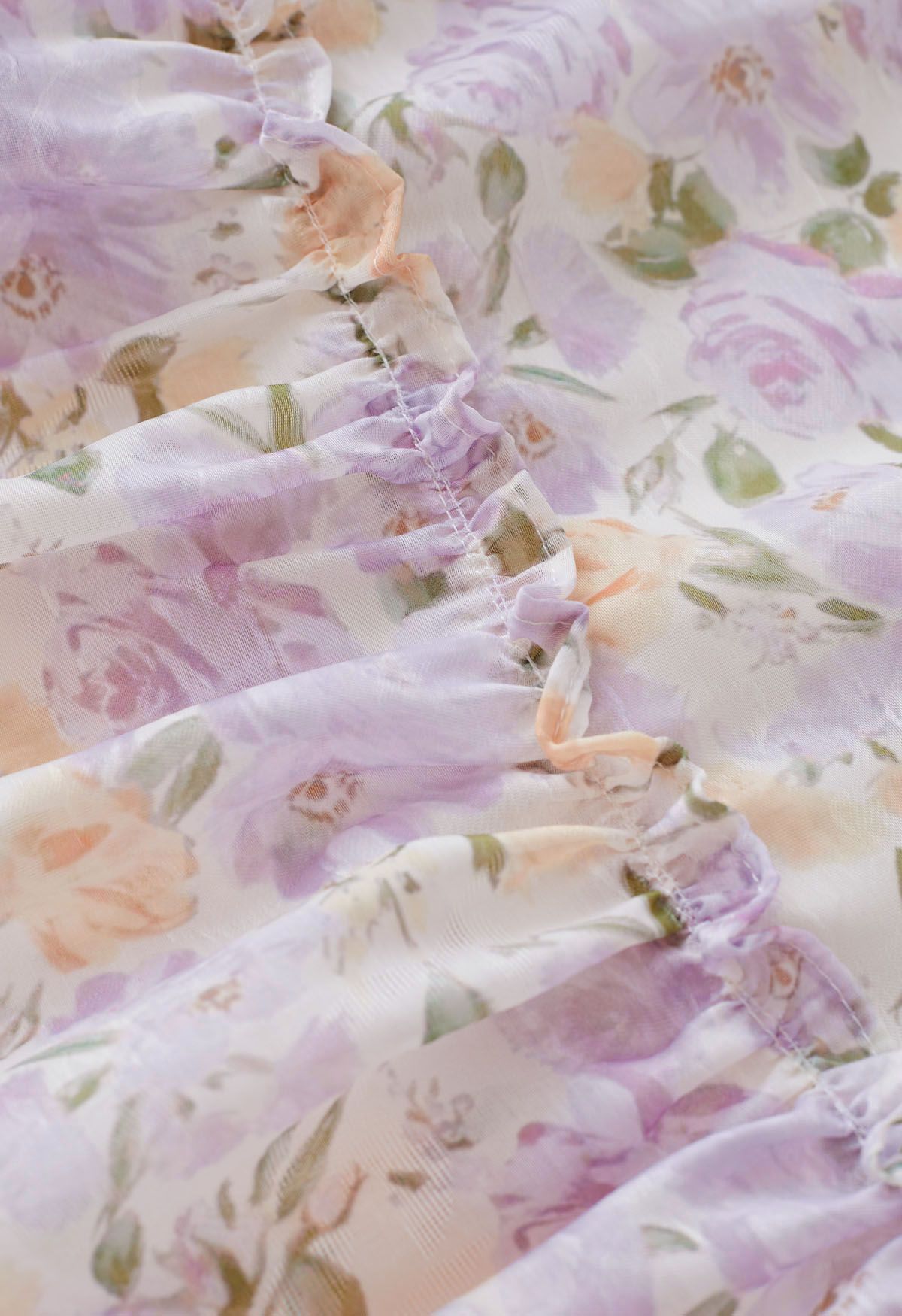 Robe mi-longue à fleurs aquarelle à col en V festonné en lilas