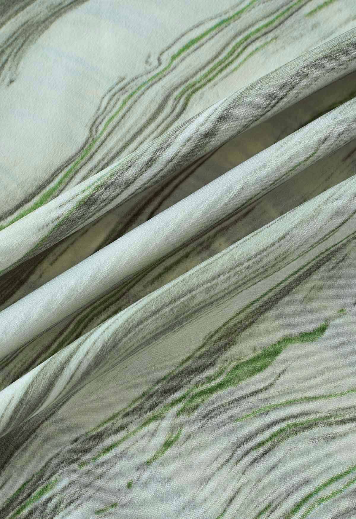 Jupe mi-longue à rabat à taille nouée à imprimé marbré en vert
