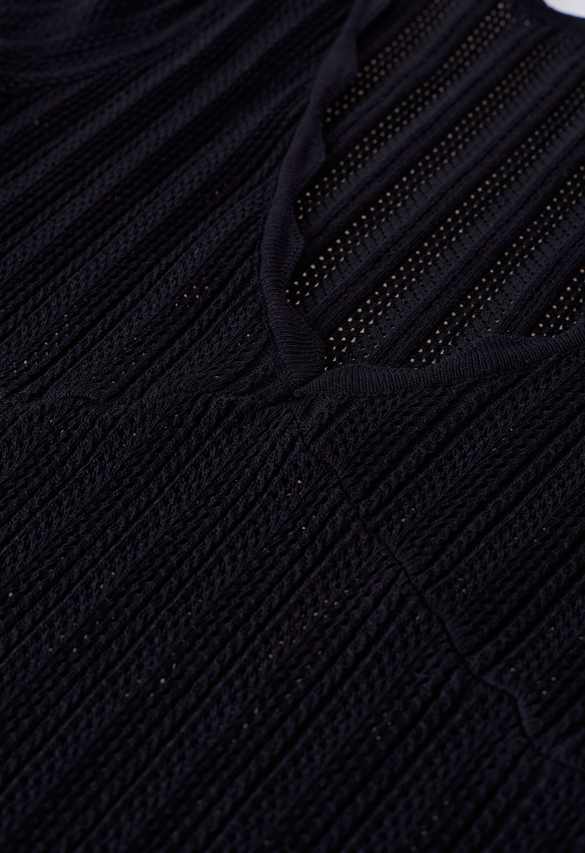 Crop top à manches courtes et bord festonné en pointelle en noir