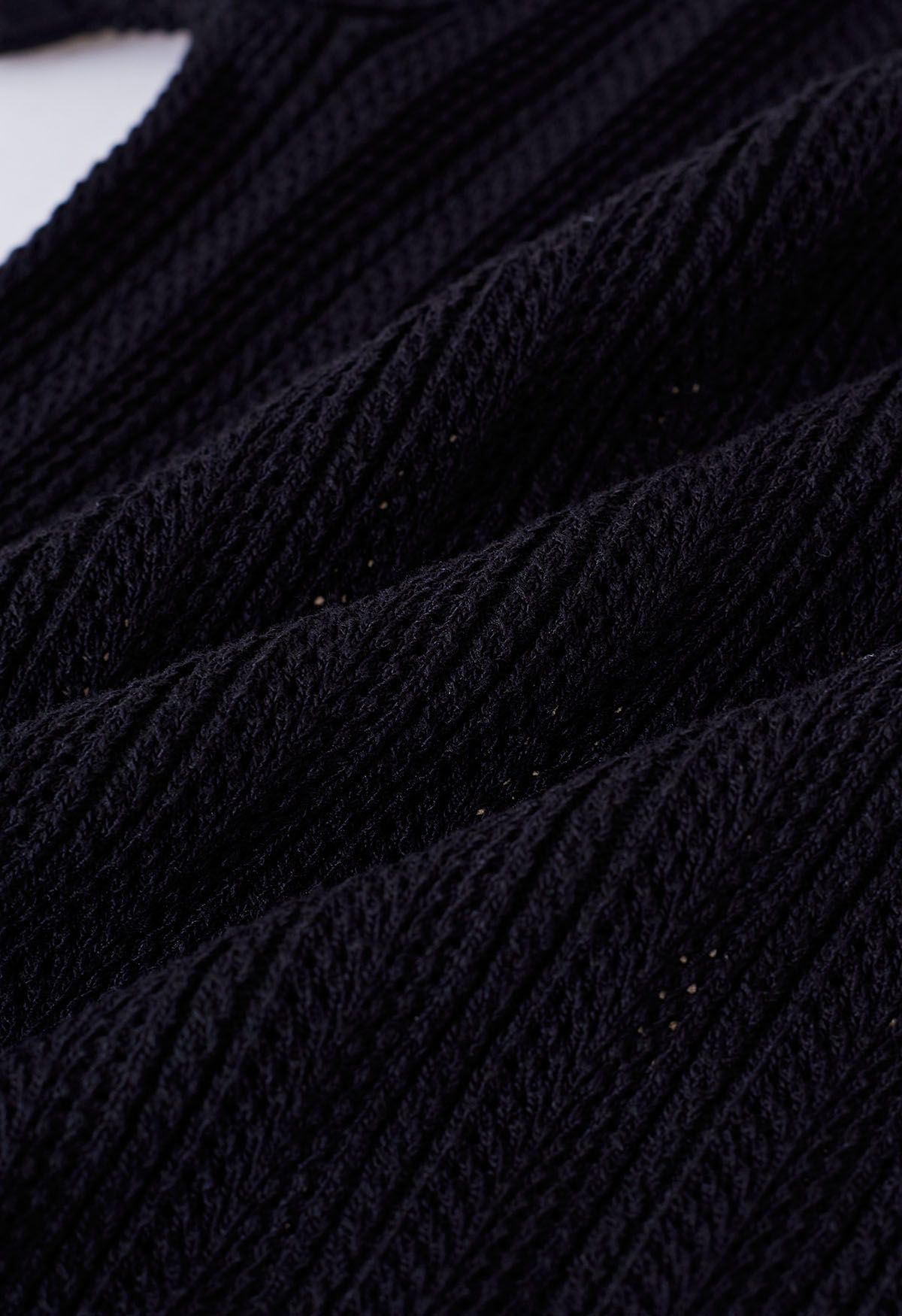 Crop top à manches courtes et bord festonné en pointelle en noir