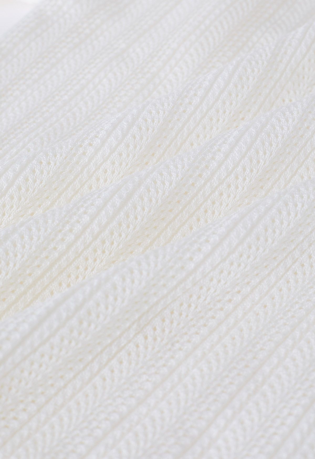Crop top à manches courtes en pointelle avec bord festonné en blanc