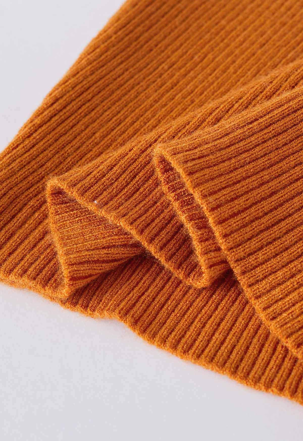 Haut en tricot dos nu à bretelles croisées en orange