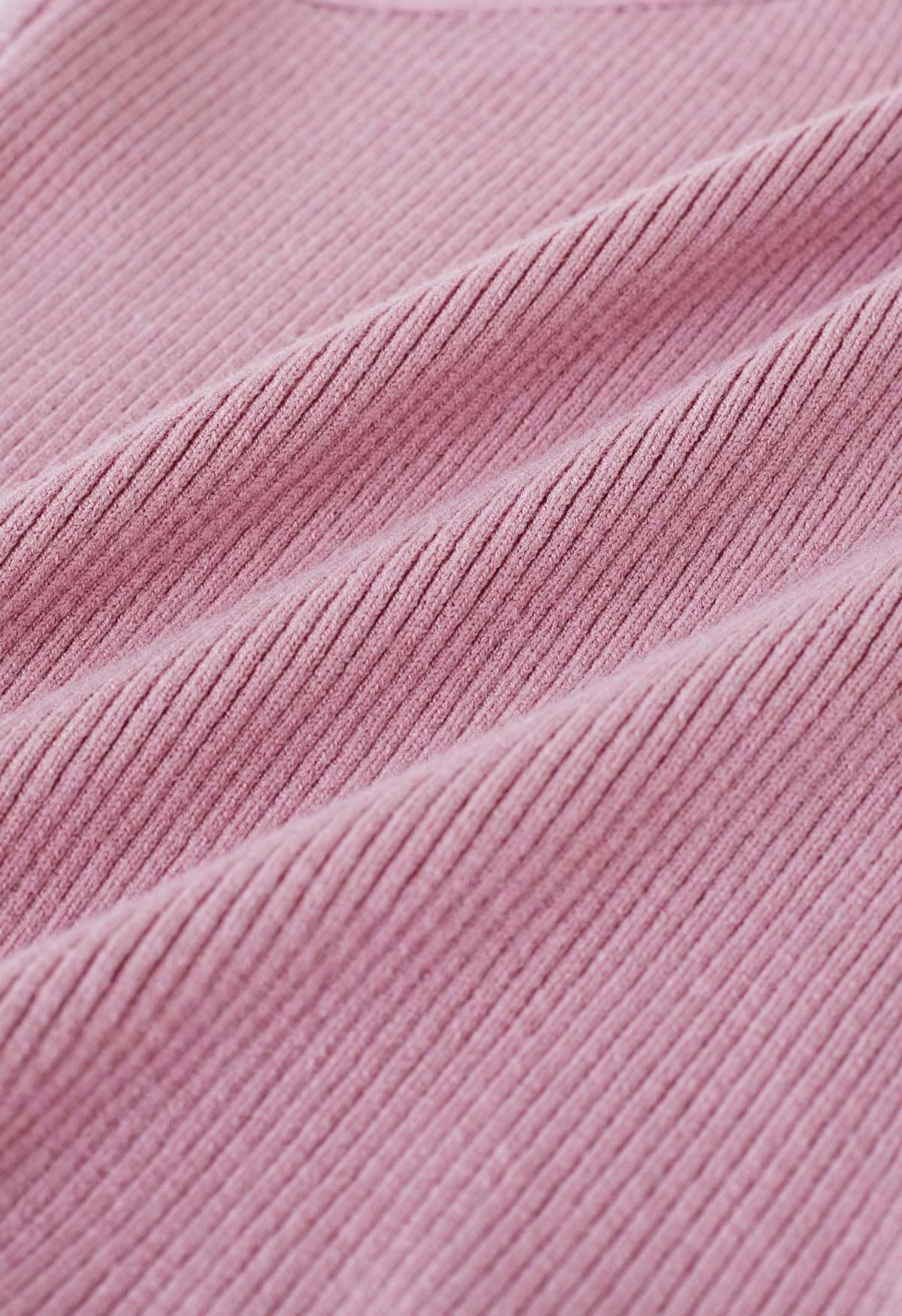 Haut en tricot dos nu à bretelles croisées en rose