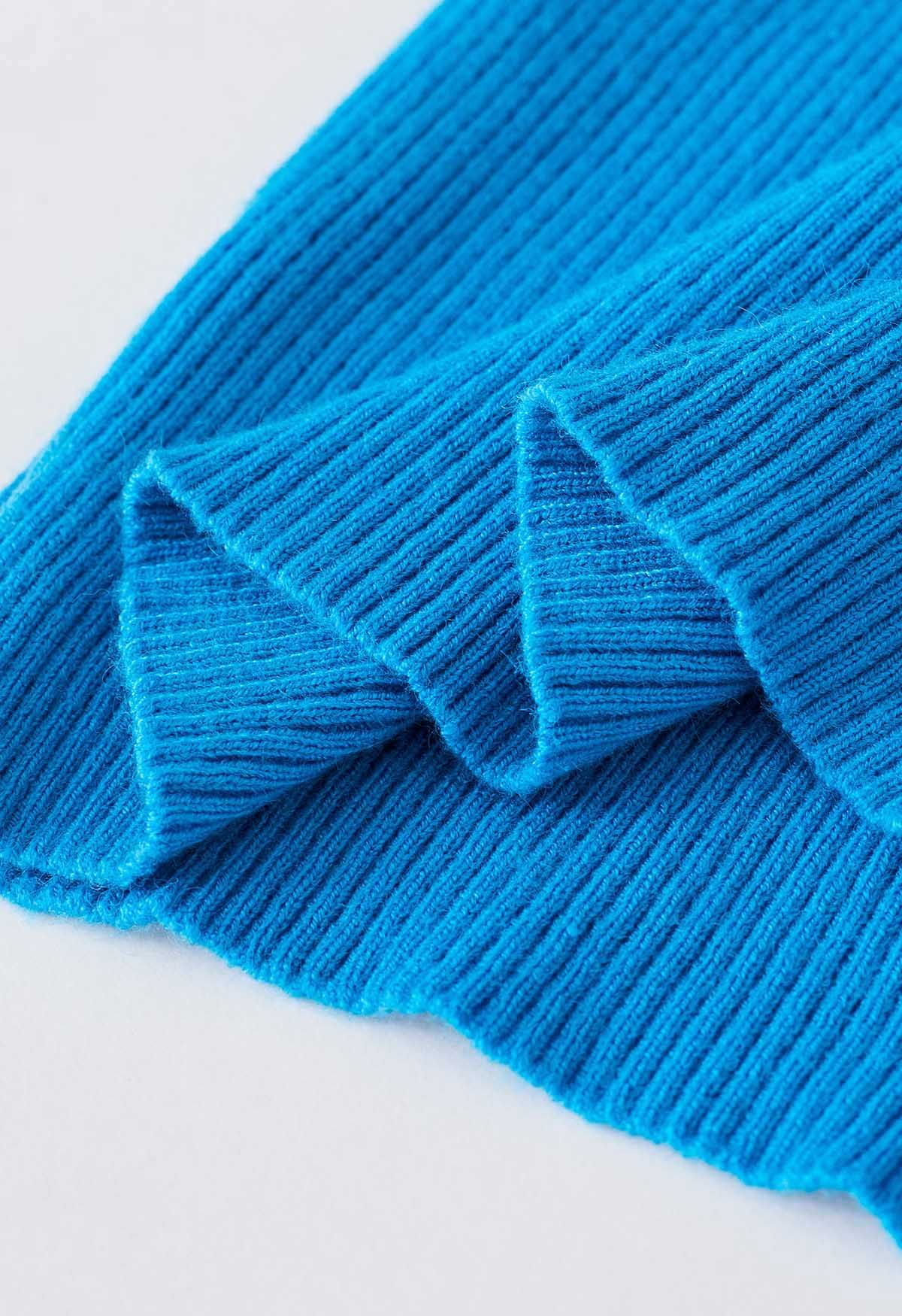 Haut en tricot dos nu à bretelles croisées en bleu