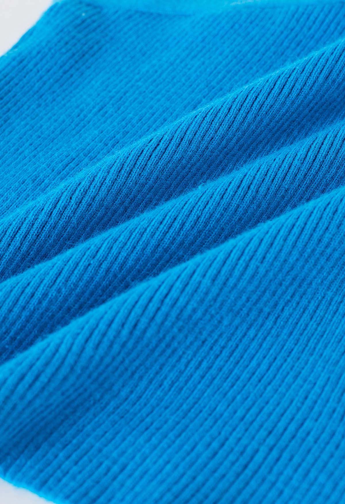 Haut en tricot dos nu à bretelles croisées en bleu