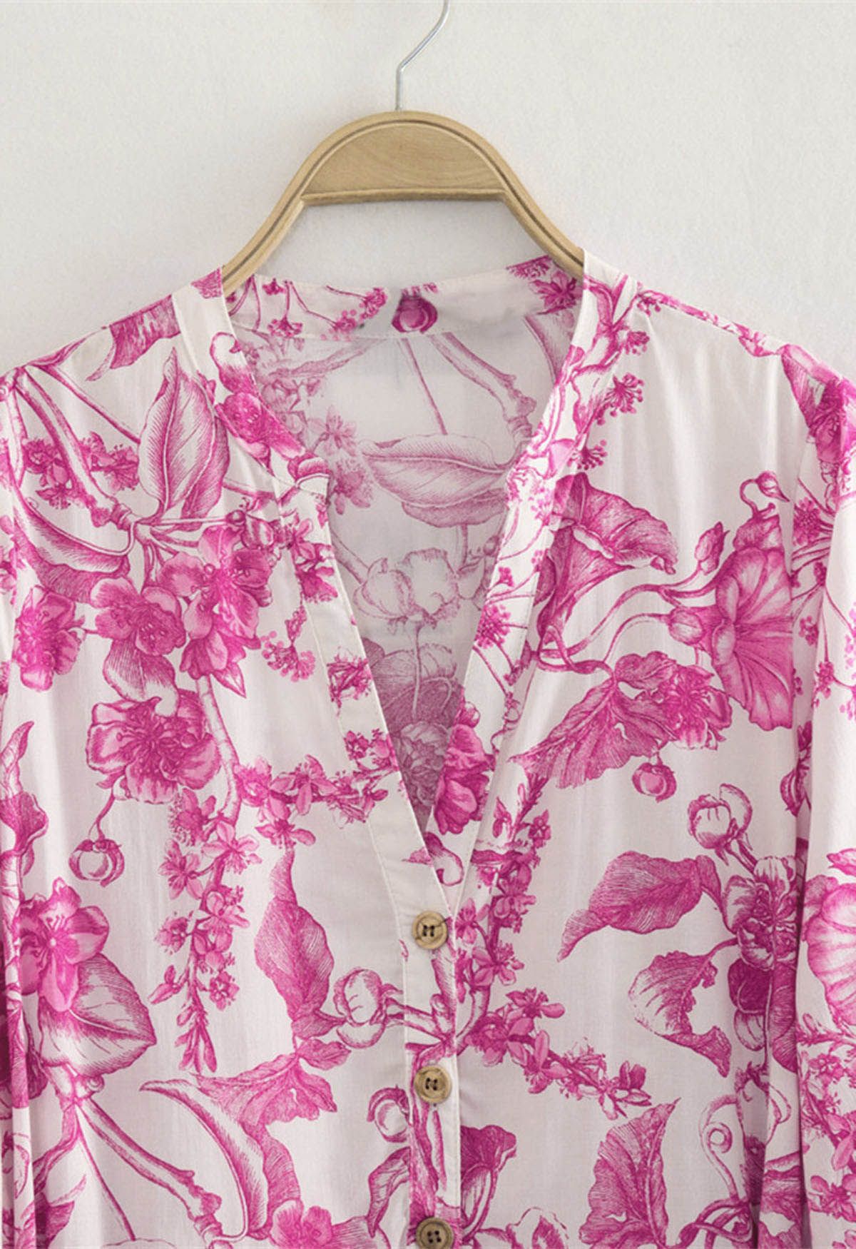 Robe mini aquarelle à fleurs rose vif et manches lanterne