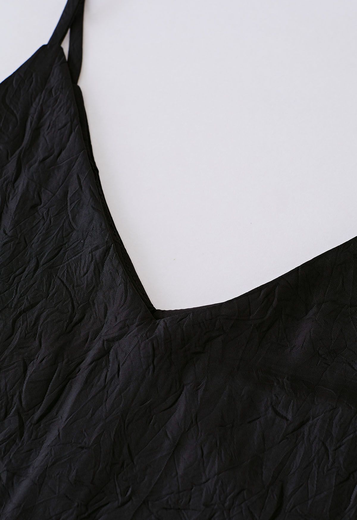 Caraco à col en V texturé en relief en noir