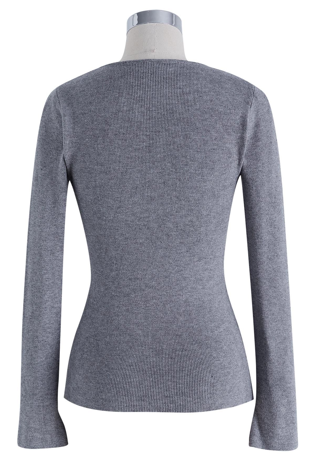 Top en tricot ajusté à encolure crantée en gris