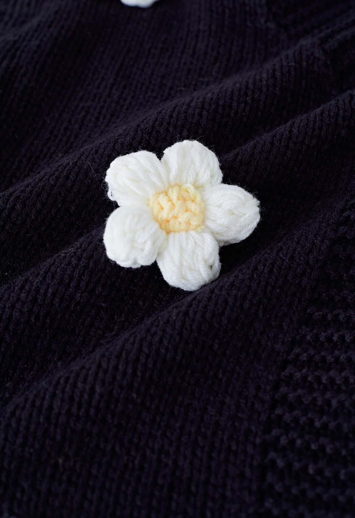 Cardigan en tricot ouvert sur le devant à fleurs en point 3D en noir