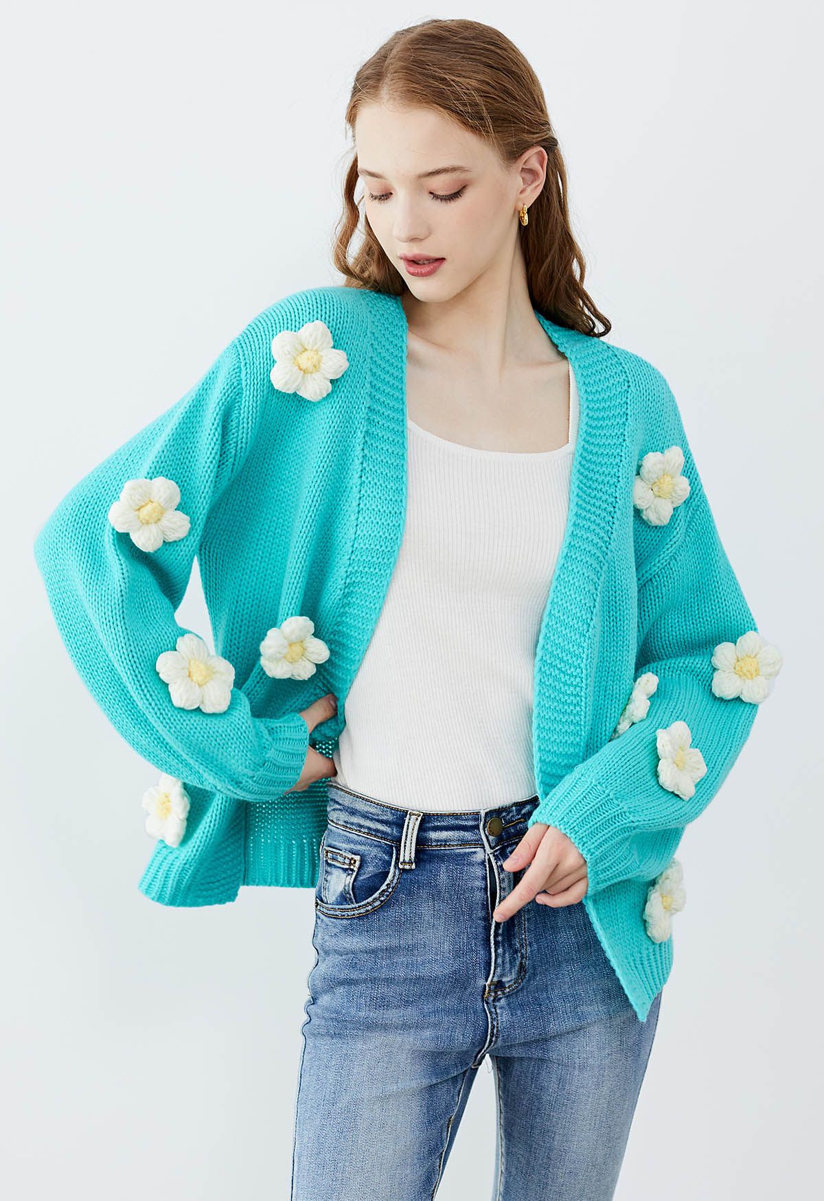 Cardigan en tricot ouvert sur le devant à fleurs en point 3D en bleu