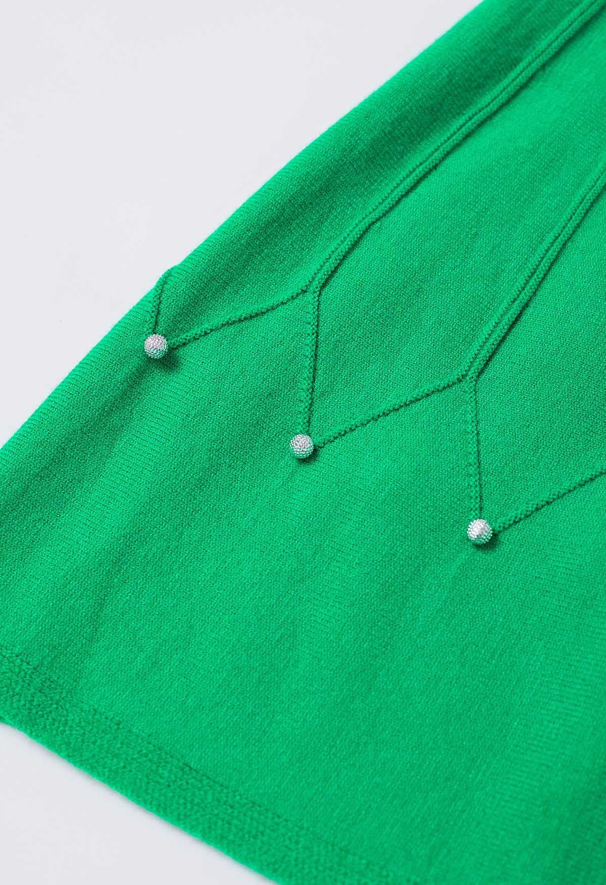 Jupe en tricot à coutures ornées de perles argentées en vert