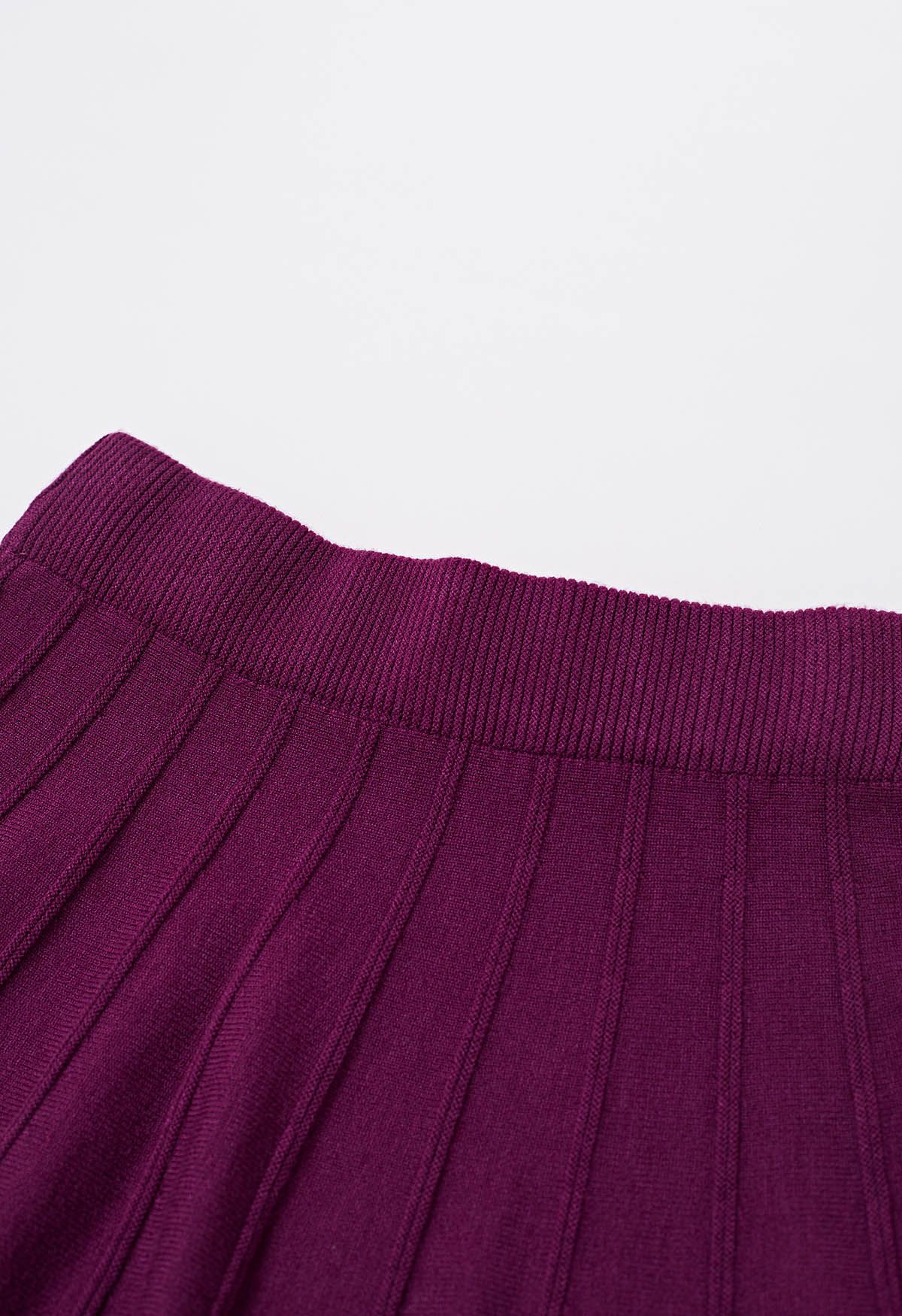 Jupe en tricot à coutures ornées de perles argentées en violet