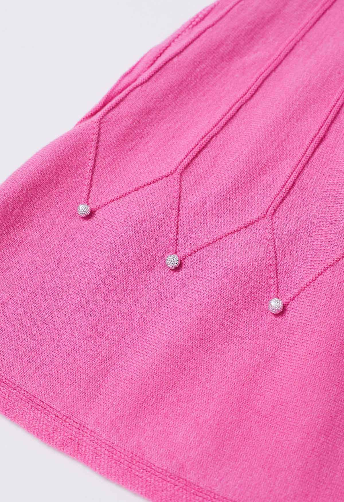 Jupe en tricot à coutures ornées de perles argentées en magenta