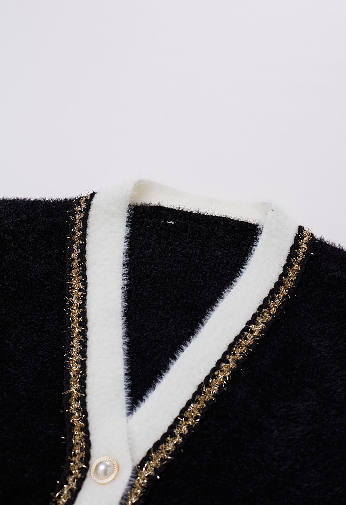 Cardigan en tricot pelucheux à franges contrastées en noir