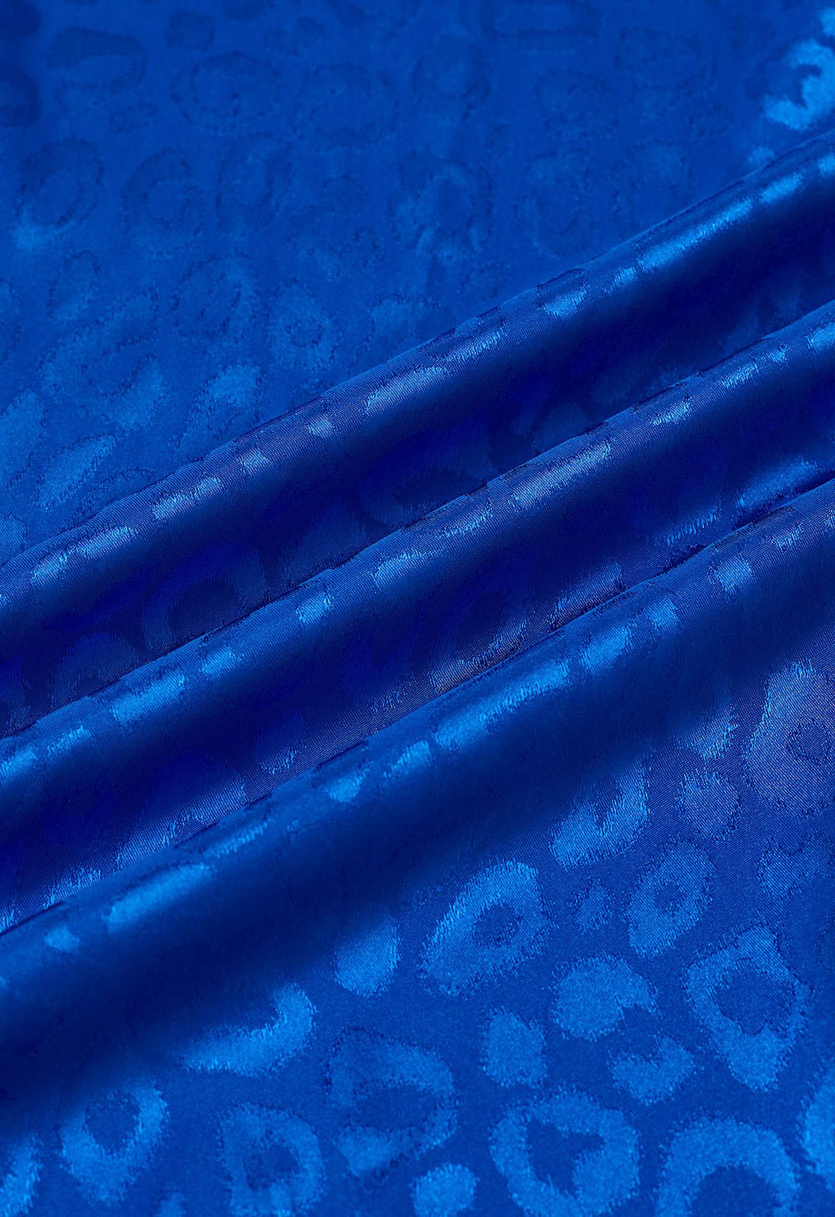 Robe longue à volants en jacquard léopard brillant en indigo