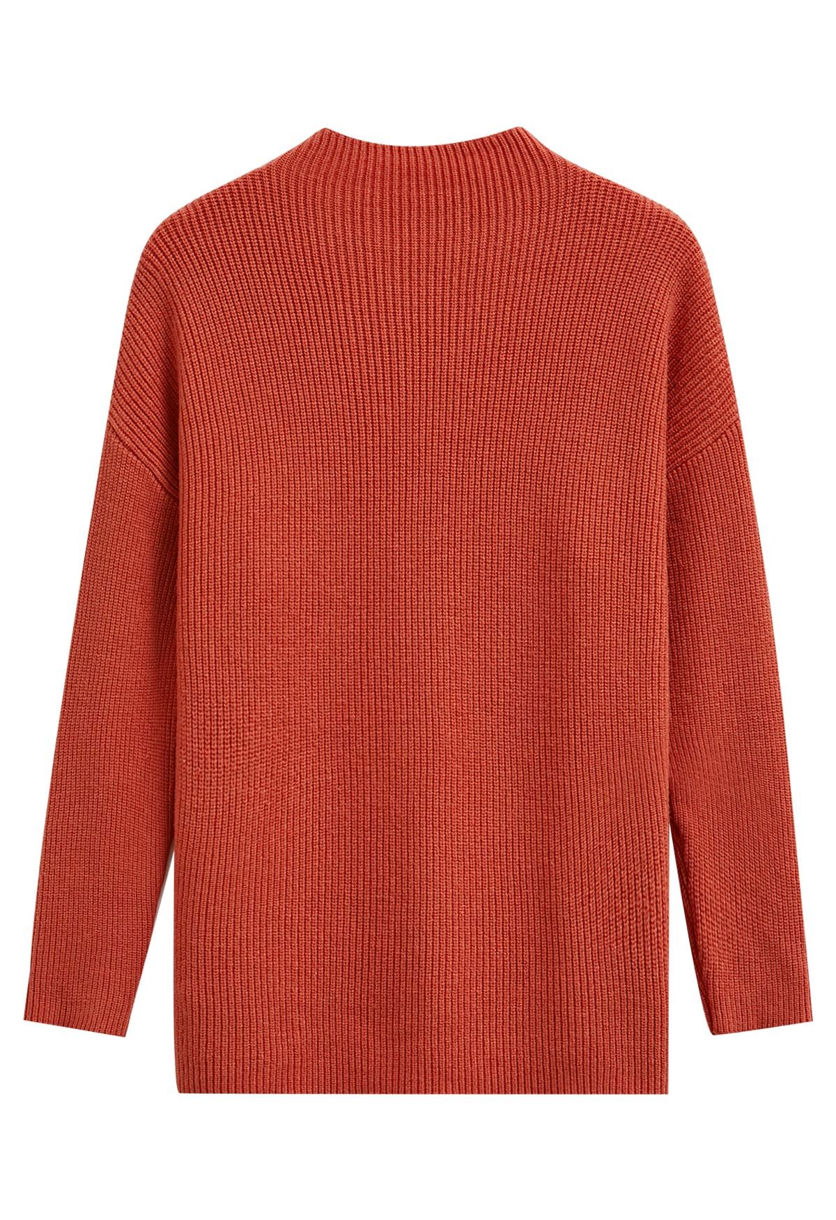 Pull en tricot côtelé à poche plaquée en rouge rouille