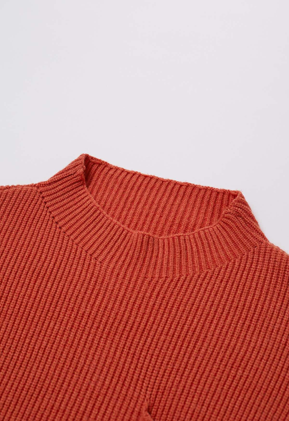 Pull en tricot côtelé à poche plaquée en rouge rouille